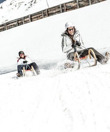 Schlittenfahren im Winterurlaub in Obergurgl | © Alexander Maria Lohmann